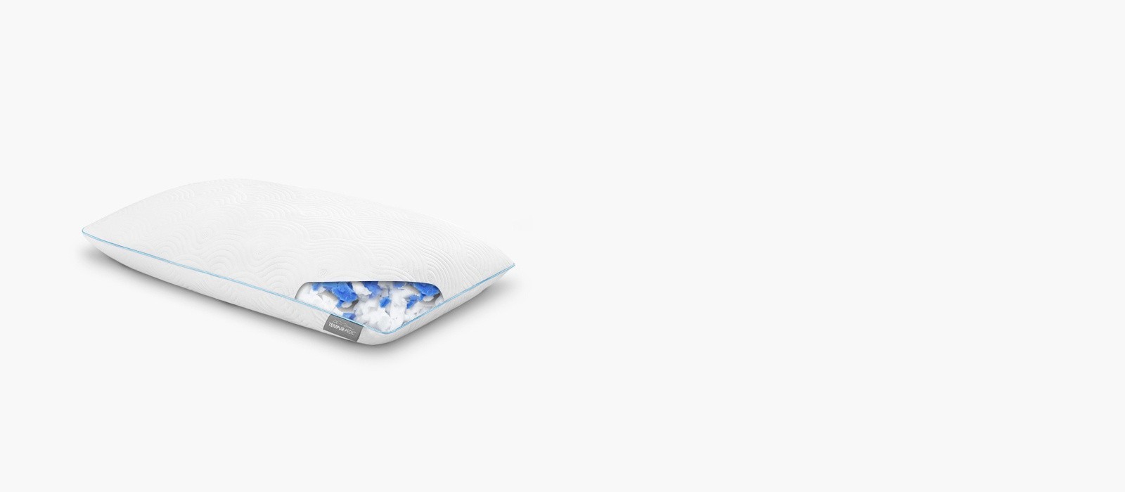 image of the Tempur-Cloud Adjustable pillow with one corner showing x-ray view of the fill material inside