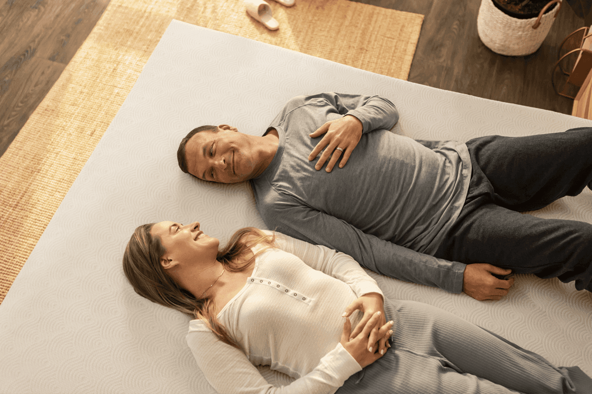 A couple laying on the TEMPUR-Cloud 3 inch topper